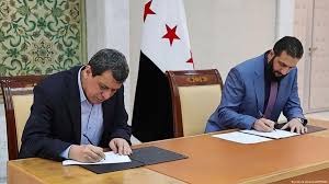 ئاگربه‌ستی نێوان ئیداره‌ی خۆسه‌ری ڕۆژئاوای كوردستان و حكومه‌تی كاتی سووریا